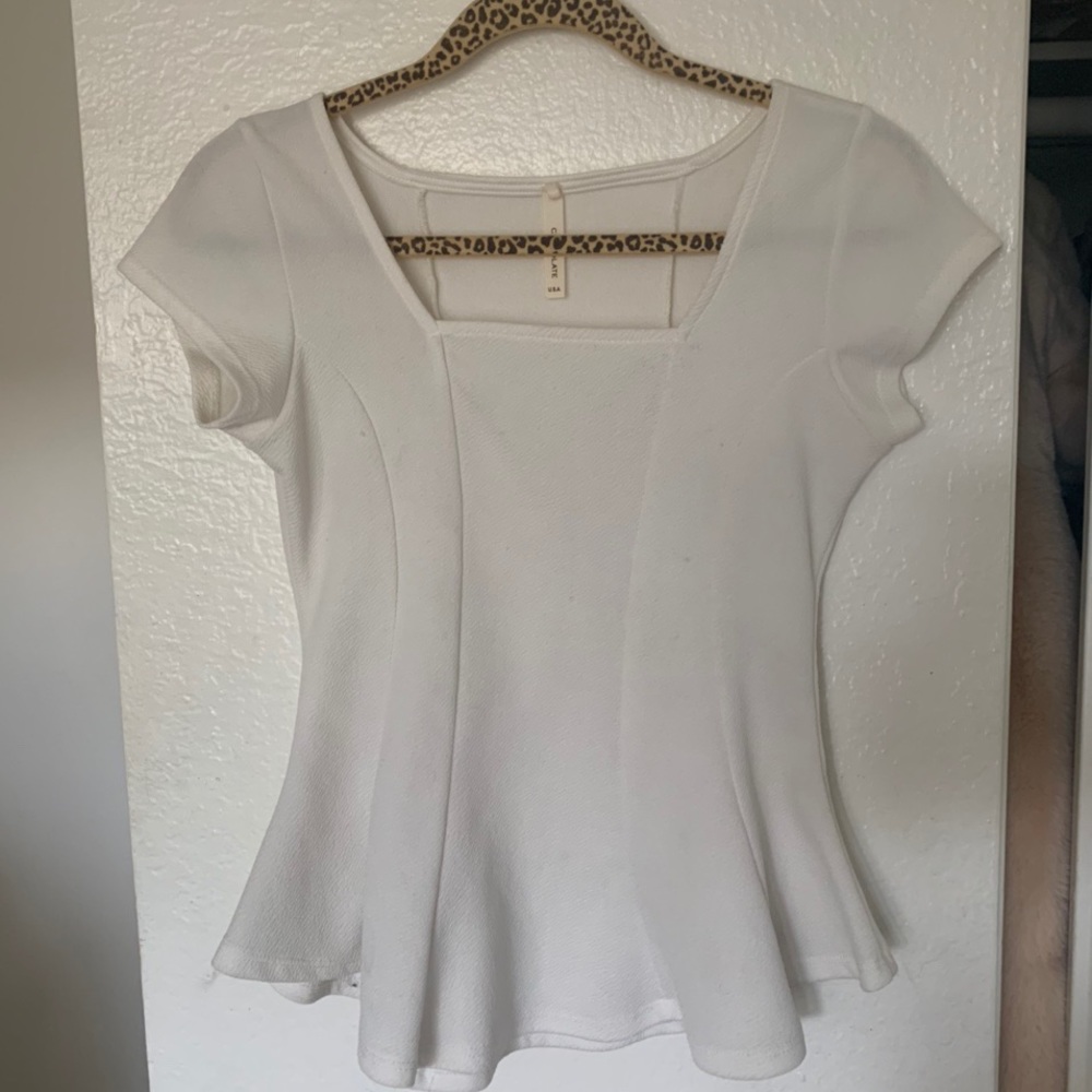 flowy white medium sized women’s top